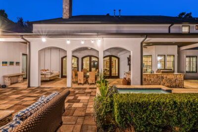 Private backyard with gunite saltwater pool, updated heater and pumps, surrounded by serene landscaping for a resort-style retreat.