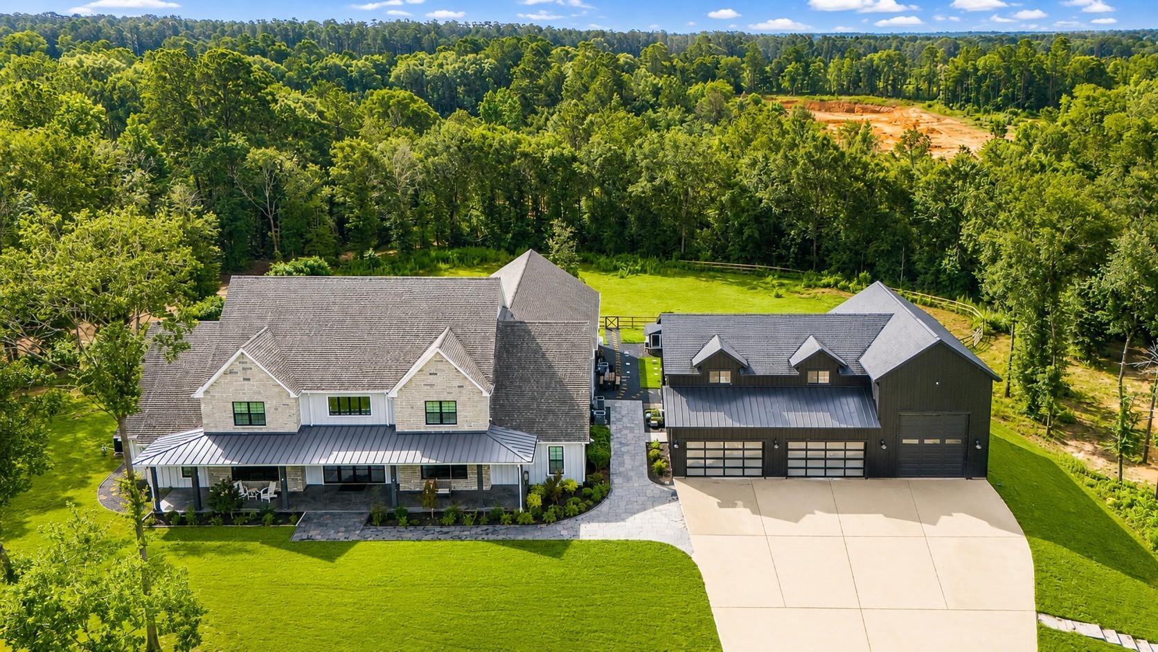 Custom-built home on 5.37 wooded acres in Peach Creek Farms, Willis, Texas