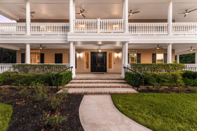 Warm exterior lighting highlighting a Katy-area home for evening listing photos”