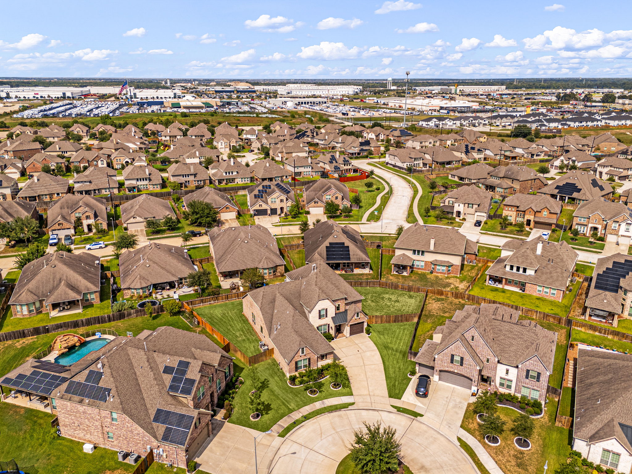 Sell my house as-is in Houston — an aerial view of a Katy-area master-planned community with homes of every condition and style.