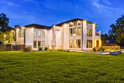 Exterior of a single-family home on a large lot in Fulshear, Texas, in fall light